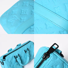 Load the image into the gallery viewer. 極美品 LOUIS VUITTON ルイヴィトン キーポルバンドリエール 25 モノグラムトリヨン ターコイズ ハンドバッグ レザー M11996 中古 4a006254