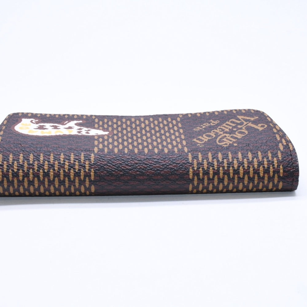 極美品 LOUIS VUITTON×NIGO ルイヴィトン ニゴ エテュイ リュネット ウッディー メガネケース GI0497 ブラウン シルバー金具 中古 4a006455