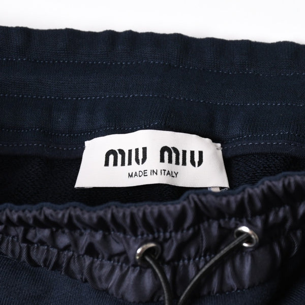 極美品 MIU MIU ミュウミュウ コットンフリース ミニスカート MJD226 ネイビー レディース ロゴパッチ シルバー金具 中古 4a006357