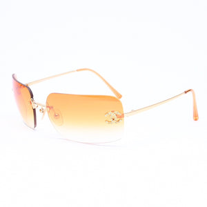 CHANEL シャネル リムレス サングラス アイウェア 4017-D c.125/56 サイズ62□17 120 ココマーク ラインストーン オレンジ 美品 中古 4a006796