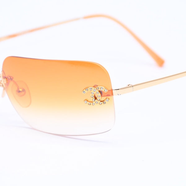 CHANEL シャネル リムレス サングラス アイウェア 4017-D c.125/56 サイズ62□17 120 ココマーク ラインストーン オレンジ 美品 中古 4a006796