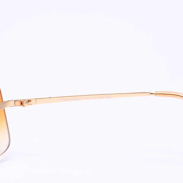 CHANEL シャネル リムレス サングラス アイウェア 4017-D c.125/56 サイズ62□17 120 ココマーク ラインストーン オレンジ 美品 中古 4a006796
