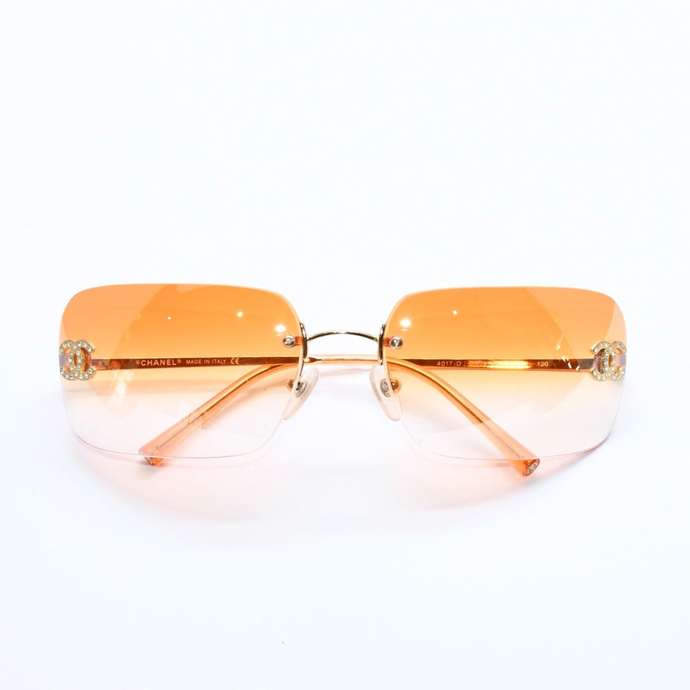 極美品 CHANEL シャネル リムレス サングラス アイウェア 4017-D c.125/56 サイズ62□17 120 ココマーク ラインストーン オレンジ 中古 4a007106