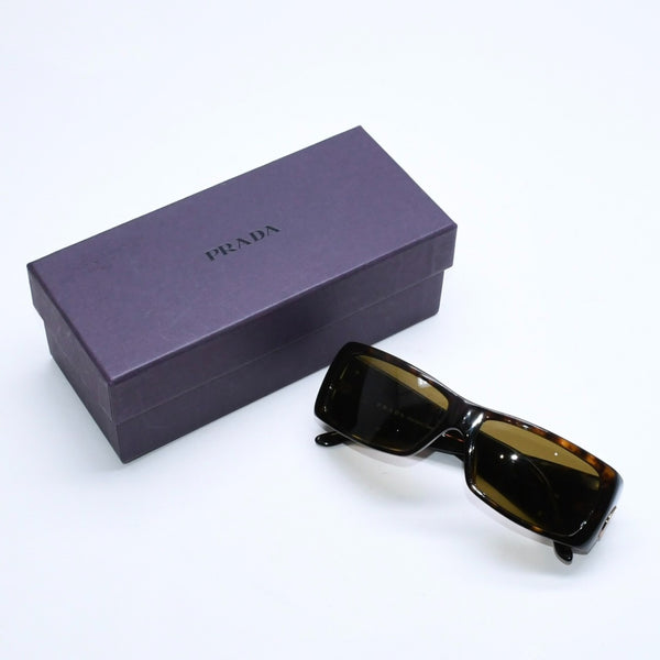 極美品 PRADA プラダ サングラス アイウェア SPR 10H 2AU 2P1 サイズ57□14 135 プラスチック 中古 4a007177
