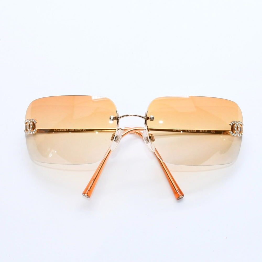 極美品 CHANEL シャネル リムレス サングラス アイウェア 4017-D c.125/56 サイズ62□17 120 ココマーク ラインストーン オレンジ 中古 4a007107