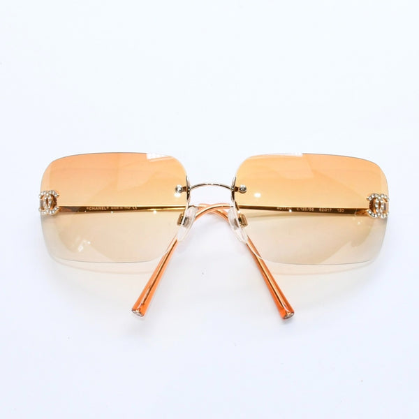 極美品 CHANEL シャネル リムレス サングラス アイウェア 4017-D c.125/56 サイズ62□17 120 ココマーク ラインストーン オレンジ 中古 4a007107