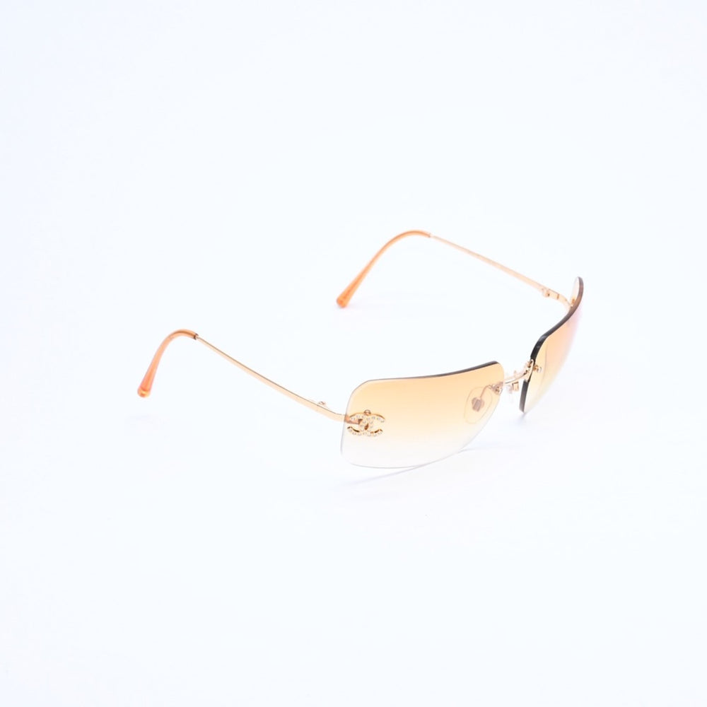 極美品 CHANEL シャネル リムレス サングラス アイウェア 4017-D c.125/56 サイズ62□17 120 ココマーク ラインストーン オレンジ 中古 4a007107