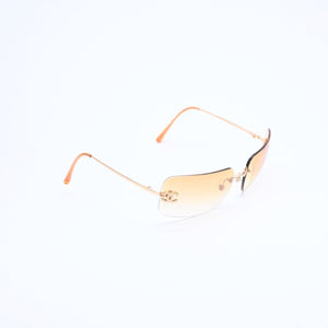 極美品 CHANEL シャネル リムレス サングラス アイウェア 4017-D c.125/56 サイズ62□17 120 ココマーク ラインストーン オレンジ 中古 4a007107