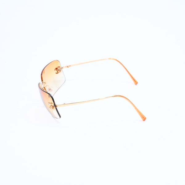 極美品 CHANEL シャネル リムレス サングラス アイウェア 4017-D c.125/56 サイズ62□17 120 ココマーク ラインストーン オレンジ 中古 4a007107
