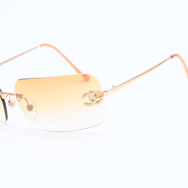 極美品 CHANEL シャネル リムレス サングラス アイウェア 4017-D c.125/56 サイズ62□17 120 ココマーク ラインストーン オレンジ 中古 4a007107