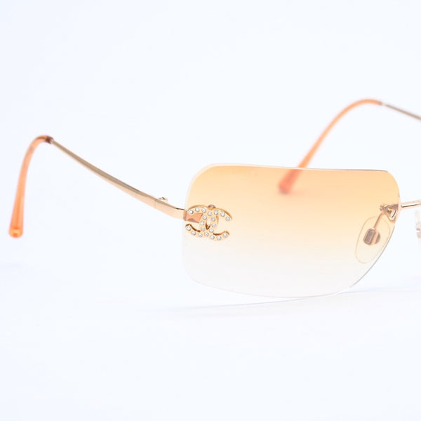 極美品 CHANEL シャネル リムレス サングラス アイウェア 4017-D c.125/56 サイズ62□17 120 ココマーク ラインストーン オレンジ 中古 4a007107