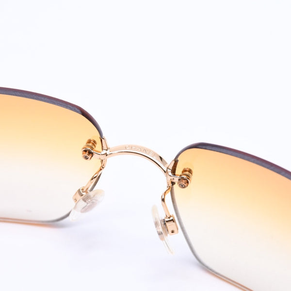 極美品 CHANEL シャネル リムレス サングラス アイウェア 4017-D c.125/56 サイズ62□17 120 ココマーク ラインストーン オレンジ 中古 4a007107