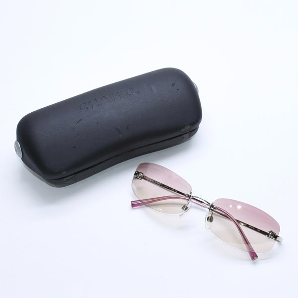 極美品 CHANEL シャネル リムレス サングラス アイウェア 4002 c.124/58 サイズ57□19 130 ココマーク ピンク 中古 4a007108
