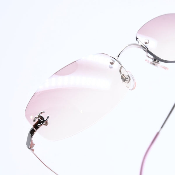 極美品 CHANEL シャネル リムレス サングラス アイウェア 4002 c.124/58 サイズ57□19 130 ココマーク ピンク 中古 4a007108