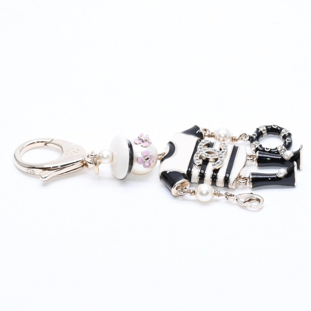 New and unused CHANEL Keyring Charm A58714 B18A Engraved Coco Mark Rhinestone Fake Pearl Resin Used 4a007019
