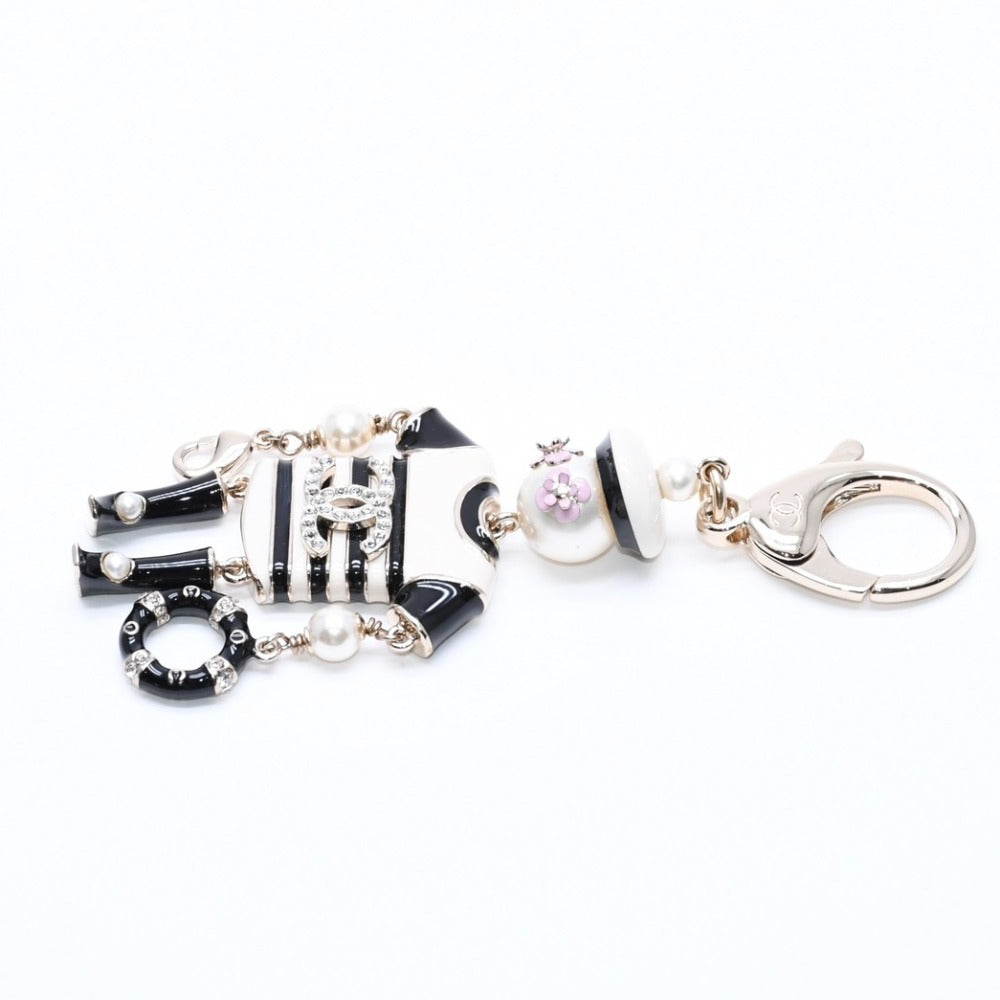 New and unused CHANEL Keyring Charm A58714 B18A Engraved Coco Mark Rhinestone Fake Pearl Resin Used 4a007019