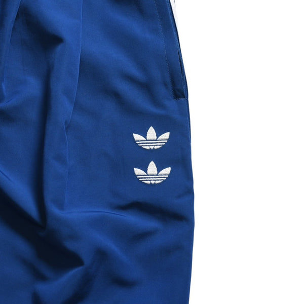 極美品 adidas × WILLY CHAVARRIA アディダス ウィリーチャバリア トラックパンツ サイズS ダークマリン 中古 4a004112