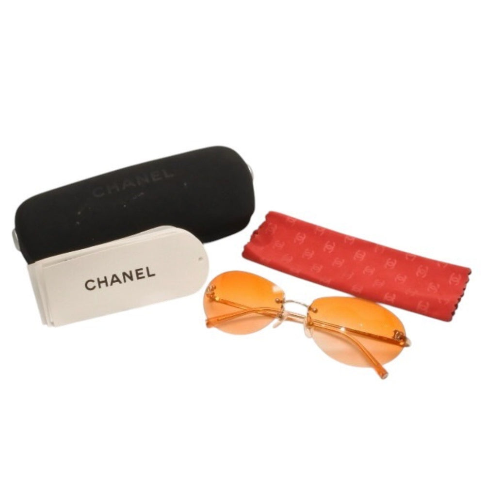 新品未使用 CHANEL シャネル リムレス サングラス アイウェア 4013 c.125/56 サイズ59□16 130 ココマーク オレンジ ゴールド 中古 4a000831