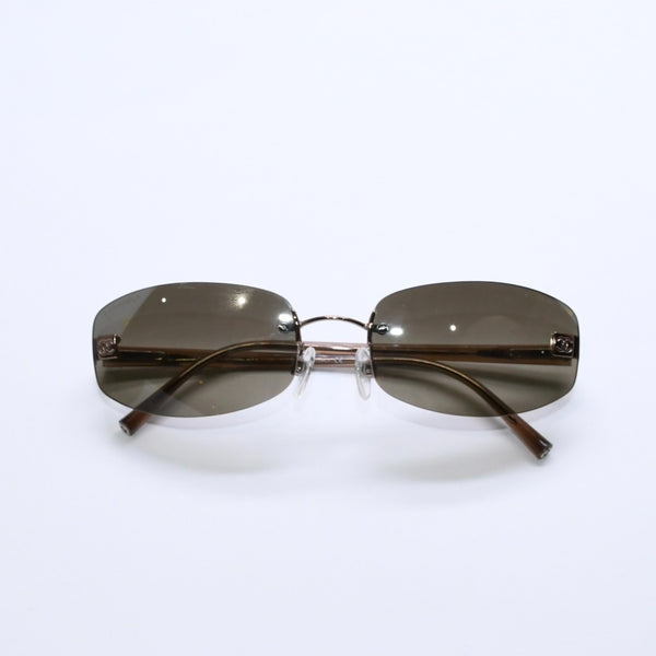 極美品 CHANEL シャネル リムレスサングラス 4067 サイズ57□18 130 c.224/54 ブラウン アセテート ココマーク ゴールド金具 中古 4a007970