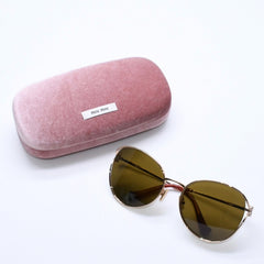 Like new condition MIU MIU sunglasses, eyewear, SMU53Y, size 58.◻20 Brown Gold Used 4a008287