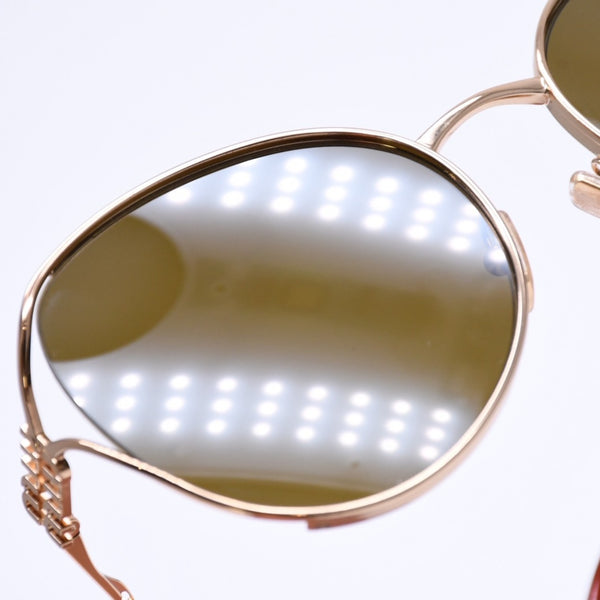 Like new condition MIU MIU sunglasses, eyewear, SMU53Y, size 58.◻20 Brown Gold Used 4a008287