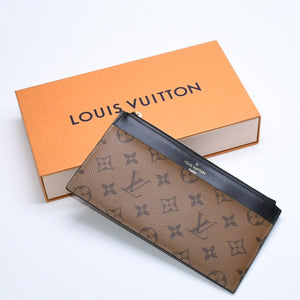 Very Good Condition LOUIS VUITTON Slim Purse Long Wallet M80390 Maron Black Monogram Reverse Gold Hardware Used 4a007907