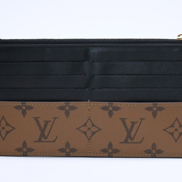 Very Good Condition LOUIS VUITTON Slim Purse Long Wallet M80390 Maron Black Monogram Reverse Gold Hardware Used 4a007907