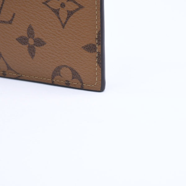 Very Good Condition LOUIS VUITTON Slim Purse Long Wallet M80390 Maron Black Monogram Reverse Gold Hardware Used 4a007907