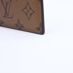 Very Good Condition LOUIS VUITTON Slim Purse Long Wallet M80390 Maron Black Monogram Reverse Gold Hardware Used 4a007907