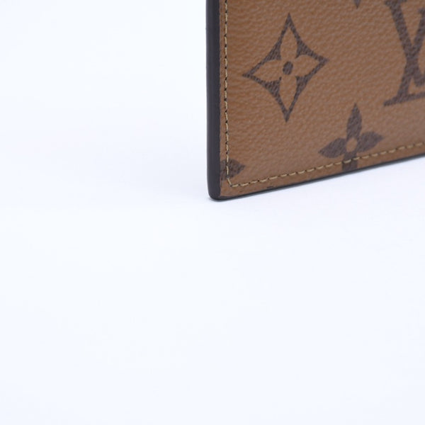Very Good Condition LOUIS VUITTON Slim Purse Long Wallet M80390 Maron Black Monogram Reverse Gold Hardware Used 4a007907