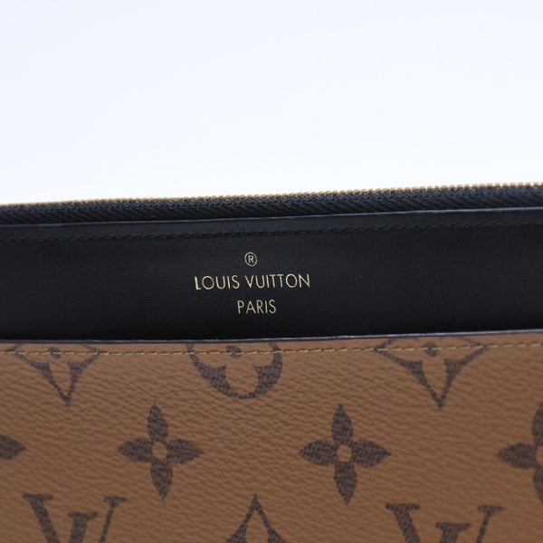 Very Good Condition LOUIS VUITTON Slim Purse Long Wallet M80390 Maron Black Monogram Reverse Gold Hardware Used 4a007907