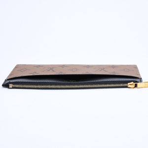 Very Good Condition LOUIS VUITTON Slim Purse Long Wallet M80390 Maron Black Monogram Reverse Gold Hardware Used 4a007907