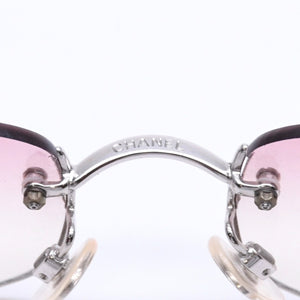CHANEL シャネル リムレス サングラス アイウェア 4002 c.124/58 サイズ57□19 130 ココマーク ピンク 美品 中古 4a008582
