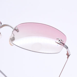 CHANEL シャネル リムレス サングラス アイウェア 4002 c.124/58 サイズ57□19 130 ココマーク ピンク 美品 中古 4a008582