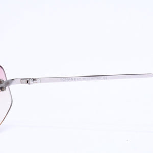 CHANEL シャネル リムレス サングラス アイウェア 4002 c.124/58 サイズ57□19 130 ココマーク ピンク 美品 中古 4a008582