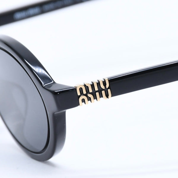 Mint condition MIU MIU sunglasses, black with gold hardware, size 50.◻18 Used 4a009637
