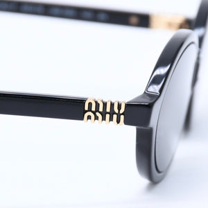 Mint condition MIU MIU sunglasses, black with gold hardware, size 50.◻18 Used 4a009637