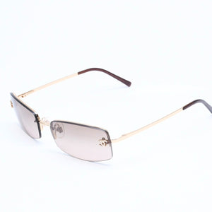 Mint condition CHANEL rimless glasses with side Coco mark, brown lenses, rhinestones, and gold hardware, 4093-B, size 56.◻16 130 Used 4a010062