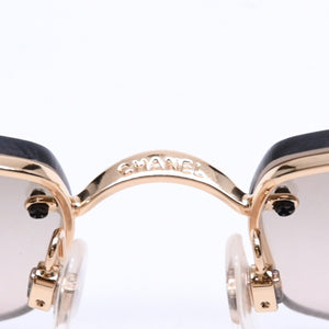 Mint condition CHANEL rimless glasses with side Coco mark, brown lenses, rhinestones, and gold hardware, 4093-B, size 56.◻16 130 Used 4a010062