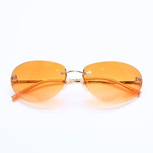 CHANEL rimless sunglasses with side Coco mark, orange lenses, and gold hardware, model number 4013 c.125/56, size 59.◻16 130 Excellent condition Used 4a010063