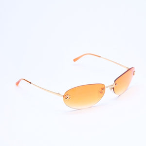 CHANEL rimless sunglasses with side Coco mark, orange lenses, and gold hardware, model number 4013 c.125/56, size 59.◻16 130 Excellent condition Used 4a010063