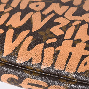 Very good condition LOUIS VUITTON Pochette accessory M92192 Monogram graffiti brown orange gold hardware used 4a009783