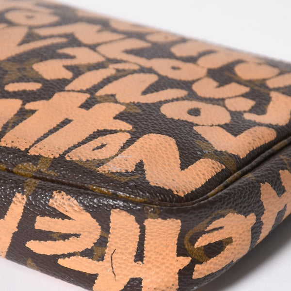 Very good condition LOUIS VUITTON Pochette accessory M92192 Monogram graffiti brown orange gold hardware used 4a009783