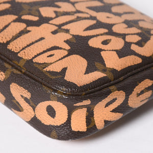 Very good condition LOUIS VUITTON Pochette accessory M92192 Monogram graffiti brown orange gold hardware used 4a009783