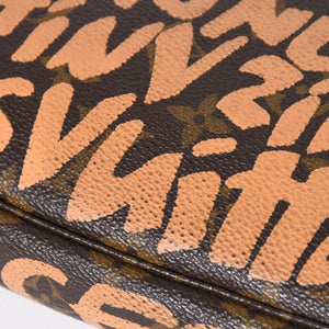 Very good condition LOUIS VUITTON Pochette accessory M92192 Monogram graffiti brown orange gold hardware used 4a009783