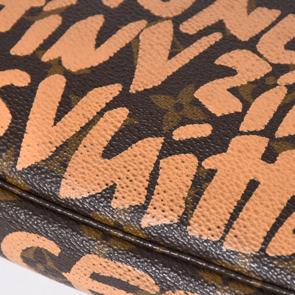 Very good condition LOUIS VUITTON Pochette accessory M92192 Monogram graffiti brown orange gold hardware used 4a009783