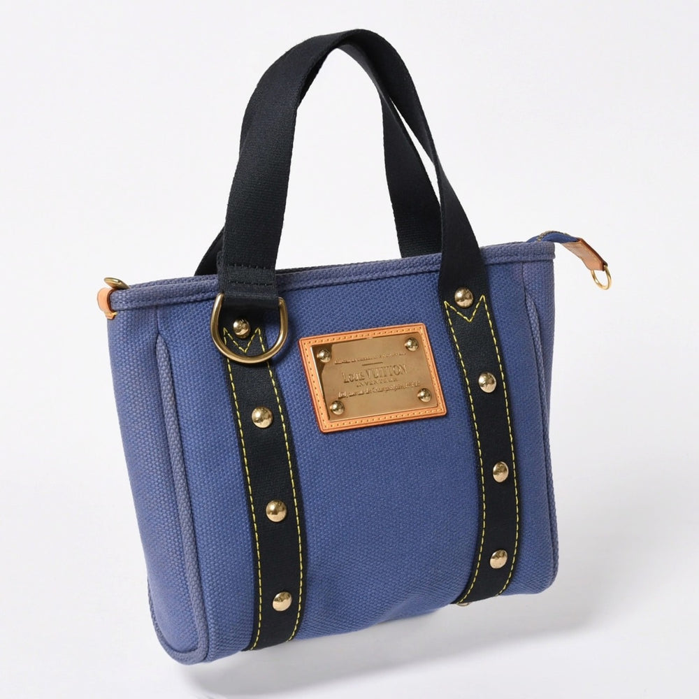Very good condition LOUIS VUITTON LV Antigua Hippo PM Mini Handbag M40090 Antigua Blue Gold Hardware Used 4a009647
