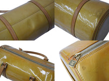 Load image into Gallery viewer, LOUIS VUITTON ルイヴィトン ベッドフォード ハンドバッグ M91006 モノグラムヴェルニ 筒型 ゴールド金具 イエロー 良品 中古 4c003531