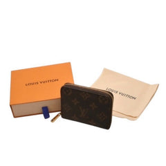 Very good condition LOUIS VUITTON Zippy coin purse M60067 Monogram canvas Gold hardware Brown Used 4a000885