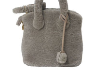 Load image into Gallery viewer, 新品同様 LOUIS VUITTON ルイヴィトン 2011AW ロックイット ヴォワヤージュ M93850 ムートン レザー グリペルル ゴールド金具 中古 4b001189